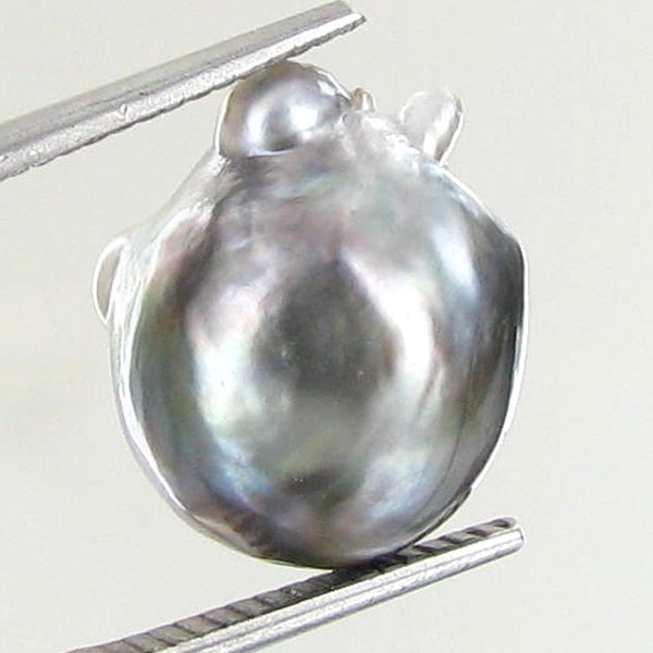 12.14ct Tahitian Baroque Pearl: Baroque shaped; drilled and ready for one-of-a-kind pendant