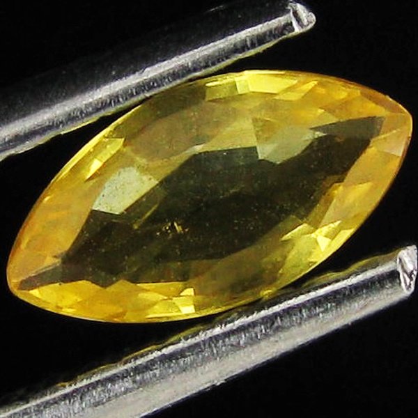 0.44ct Yellow Sapphire Marquise: Excellent piece; well cut and colored; with treatment
