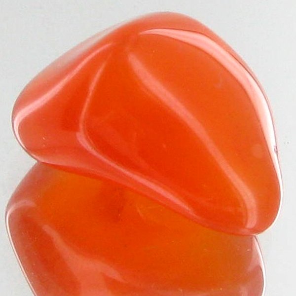 22.8ct Carnelian Freeform Cabochon: Excellent and well colored; with treatment