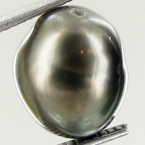 8.67ct Freeform Tahitian Black Pearl: Scarcely shaped; drilled and ready for one-of-a-kind pendant