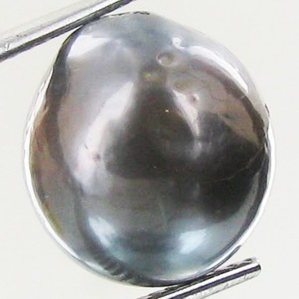 10.66ct Freeform Tahitian Black Pearl: Scarcely shaped; drilled and ready for one-of-a-kind pendant