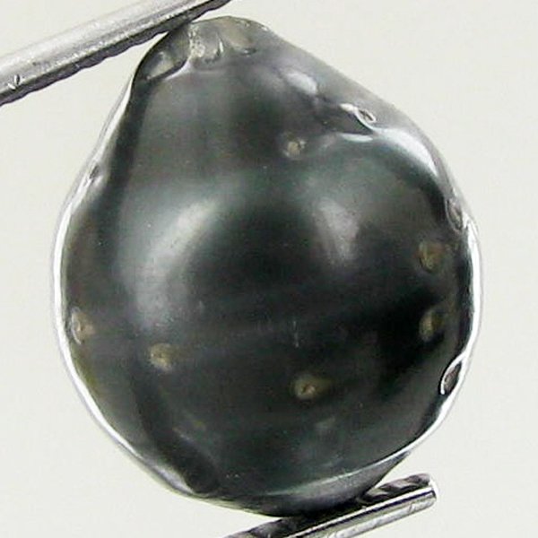 13.8ct Freeform Tahitian Black Pearl: Scarcely shaped; drilled and ready for one-of-a-kind pendant