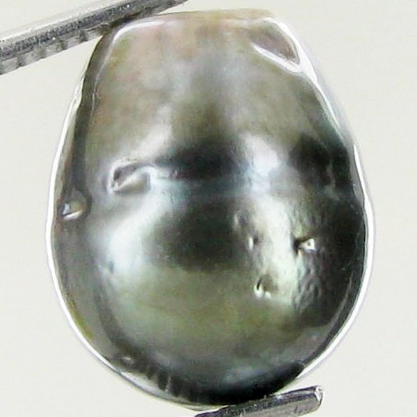 12.91ct Freeform Tahitian Black Pearl: Scarcely shaped; drilled and ready for one-of-a-kind pendant