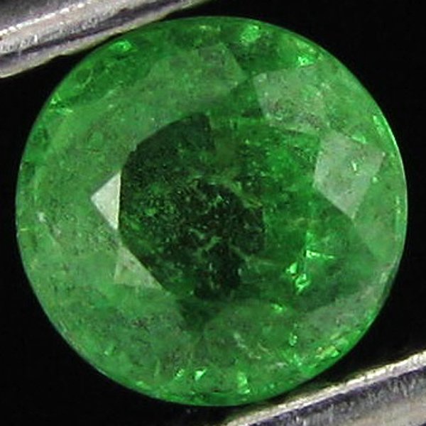 0.6ct Clean Tsavorite Garnet Round: Excellent Piece; well colored and cut; with treatment