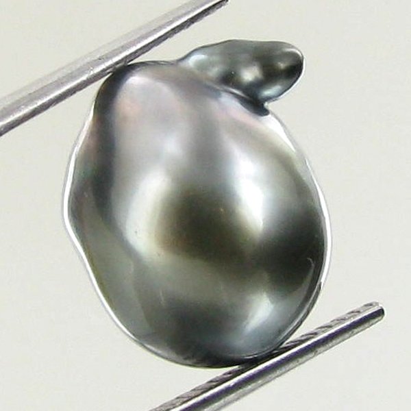 10.75ct Tahitian Baroque Pearl: Baroque shaped; drilled and ready for one-of-a-kind pendant
