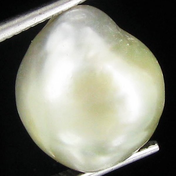 9.9ct Freeform Tahitian Black Pearl: Scarcely shaped; drilled and ready for one-of-a-kind pendant