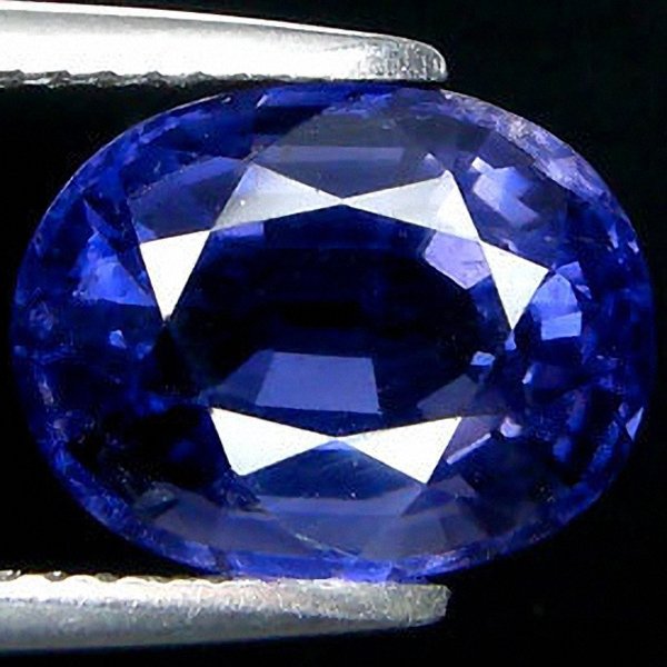 4.08ct Oval Cut Natural Blue Violet Iolite: Excellent piece; Well cut and colored; with treatment