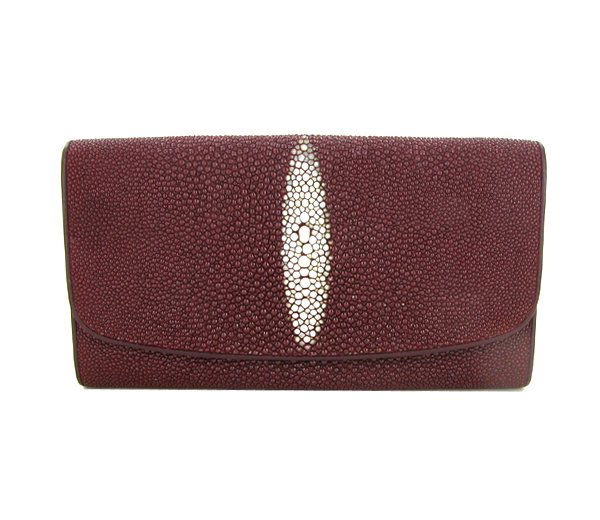 Ladies Stingray Hide Clutch Purse Wallet: Well made; brand new ladies Stingray Hide burgundy clutch purse/wallet. 7.5" x 4" x 1" when folded. Multiple inside sections; one zippered with multiple dividers and a smaller zippered section inside