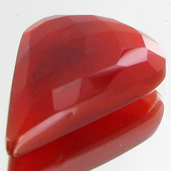 34.95ct Natural Faceted Carnelian: Excellent piece; well cut and colored; with treatment