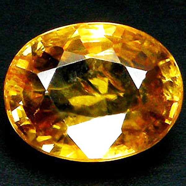 2.32ct Oval Cut Yellow Zircon: Excellent piece; Well cut and colored; with treatment