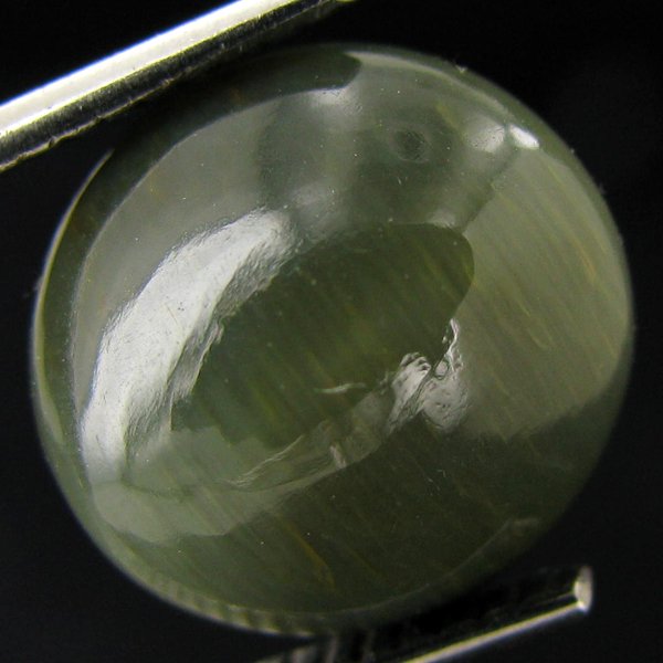7.05ct Apatite Cat'S Eye Cabochon Oval: Excellent piece; well cut & colored; with treatment