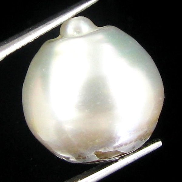 22.42ct Tahitian Baroque Pearl: Baroque shaped; drilled and ready for one-of-a-kind pendant