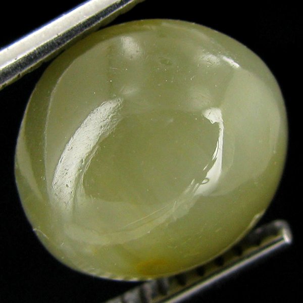 5.4ct Apatite Cat'S Eye Cabochon Oval: Excellent piece; well cut & colored; with treatment