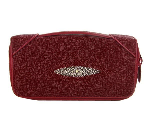 Stingray Hide Clutch Purse Wallet: Well made; brand new Stingray Hide burgundy clutch purse/wallet. 8.5" x 4.5" x 1.5" when folded. Multiple inside sections; two zippered outside with multiple dividers and a smaller zippered section in