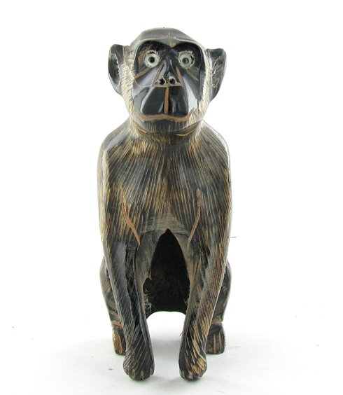 Scarce Water Buffalo Horn Scrimshaw Monkey: Excellent piece; finely carved in rhino image on water buffalo horn; 4"