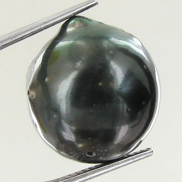 25.56ct Tahitian Baroque Pearl: Baroque shaped; drilled and ready for one-of-a-kind pendant
