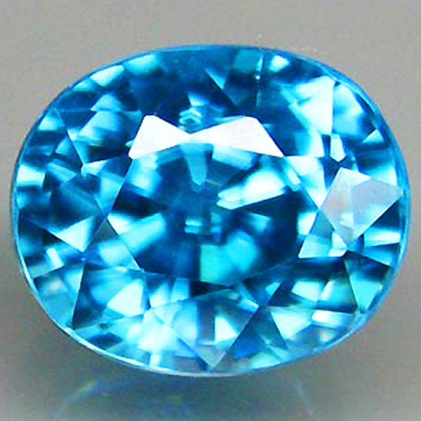 2.43ct Blue Zircon Oval : Excellent heated grade 9 of 10 specimen; estimated Gem Guide wholesale $292, estimated retail $851; Cambodia origin