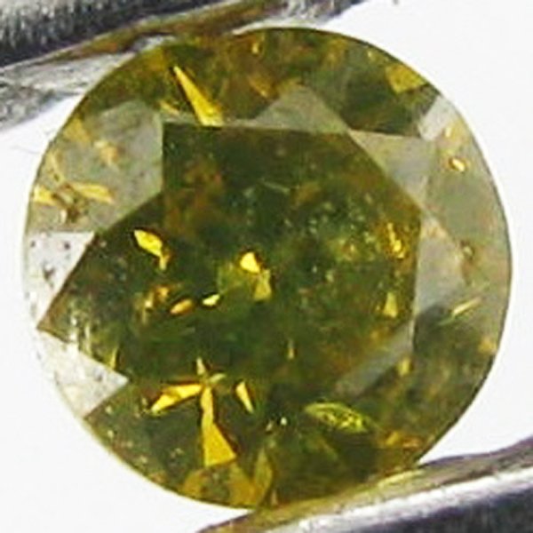 0.05ct Yellow Diamond: Excellent piece; well cut and colored; with treatment