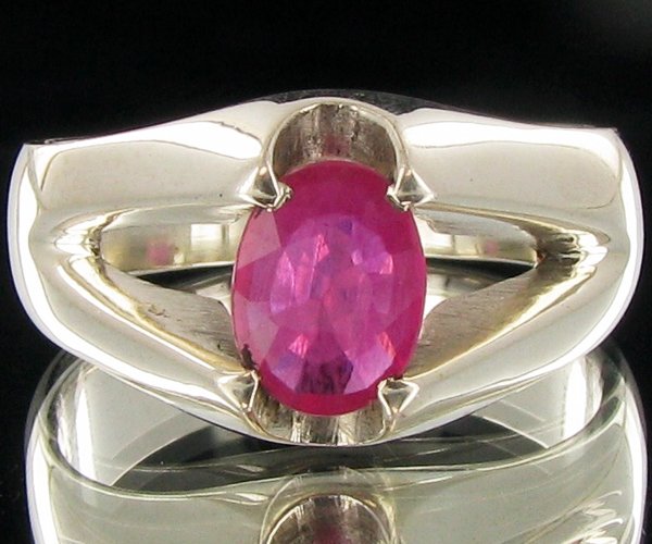 31.2twc Madagascar Ruby Sterling Ring: Well crafted piece; stone with customary treatment