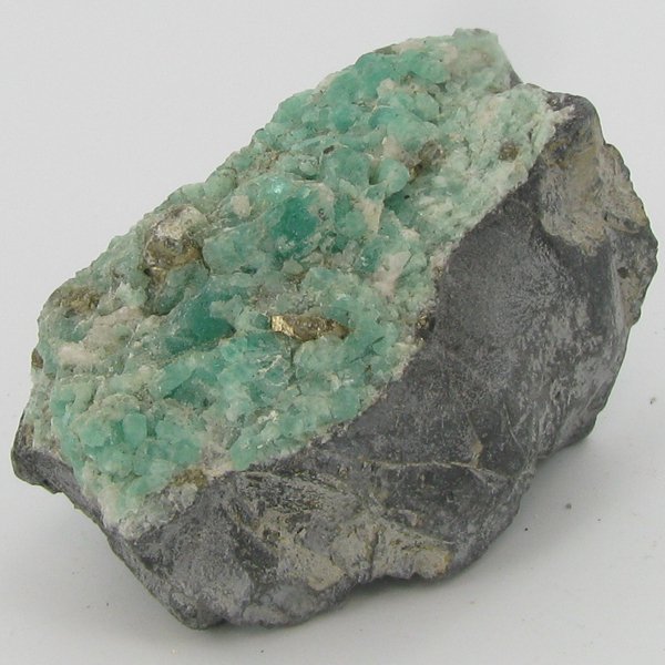 330ct Natural Colombian Emerald Crystal Cluster: Excellent specimen with pyrite crystals and small emerald crystal vein on base material