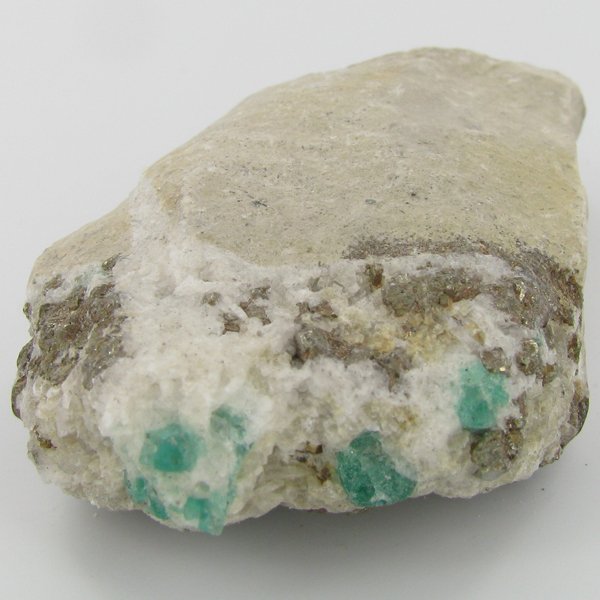 310ct Natural Colombian Emerald Crystal Cluster: Excellent specimen with pyrite crystals and small emerald crystal vein on base material