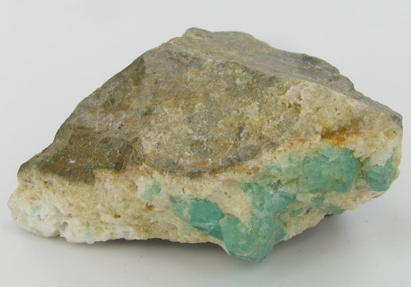 290ct Natural Colombian Emerald Crystal Cluster: Excellent specimen with pyrite crystals and small emerald crystal vein on base material