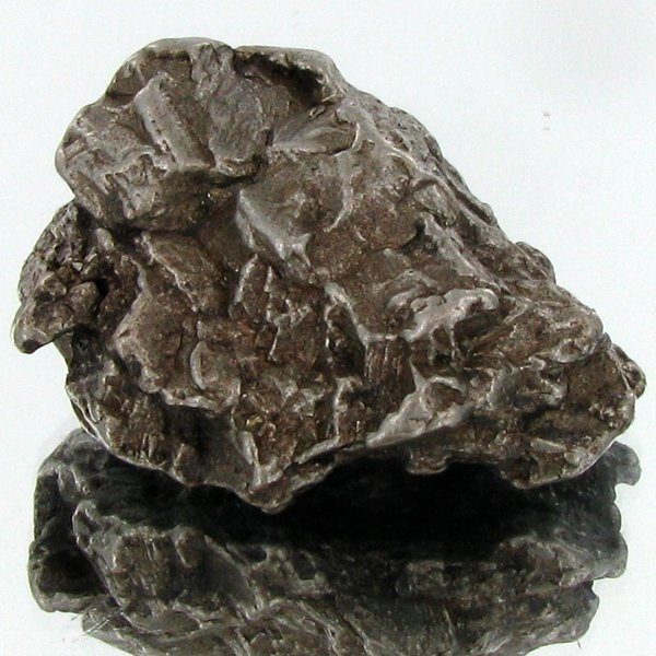 61gm Meteorite Campo Del Cielo Argentina: Scarce remnant of prehistoric (2000-4000bc) meteorite discovered in the 16th century; a main mass of 18 tons has been discovered along with a shower of smaller breakup fragments; cosmic age is young f