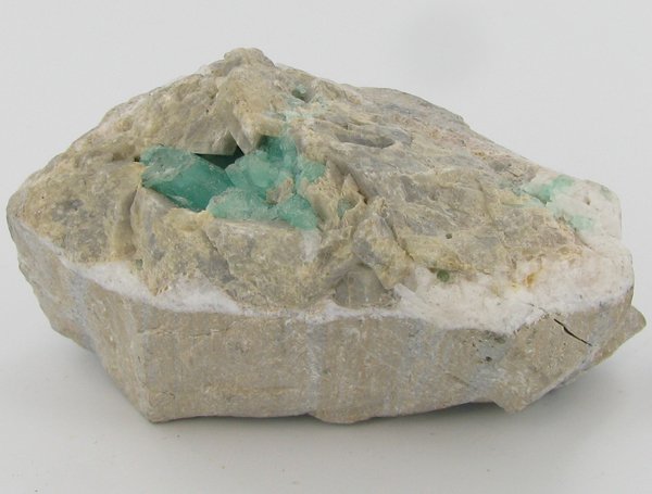 765ct Natural Colombian Emerald Crystal Cluster: Excellent specimen with pyrite crystals and small emerald crystal vein on base material