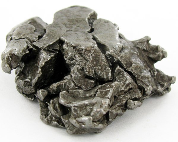 55gm Meteorite Campo Del Cielo Argentina: Scarce remnant of prehistoric (2000-4000bc) meteorite discovered in the 16th century; a main mass of 18 tons has been discovered along with a shower of smaller breakup fragments; cosmic age is young f