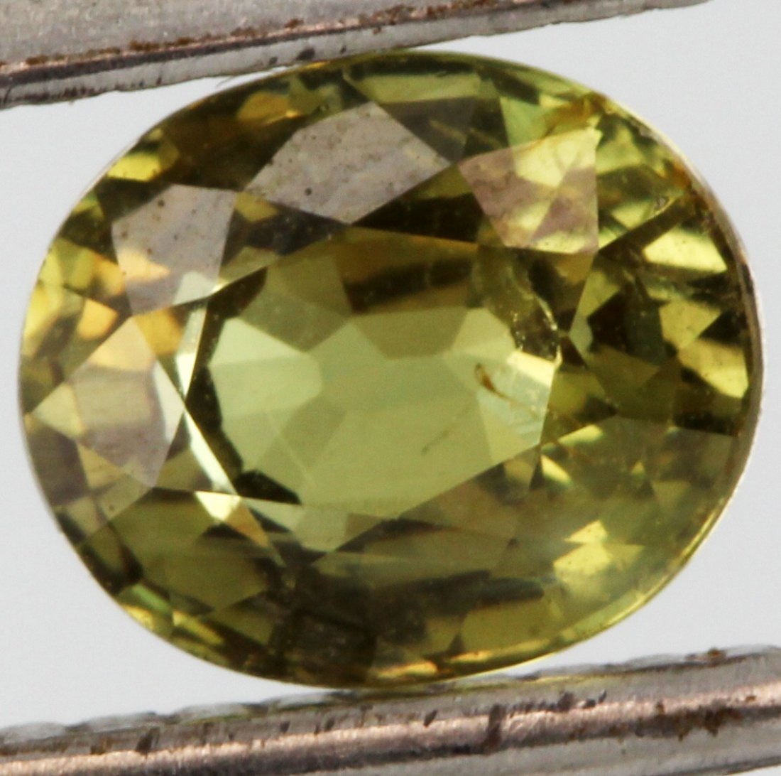 1.23ct Green Color Change Alexandrite Oval Cut: Excellent untreated grade 8 of 10 specimen; estimated Gem Guide wholesale $4500, estimated retail $12000; Tanzania origin