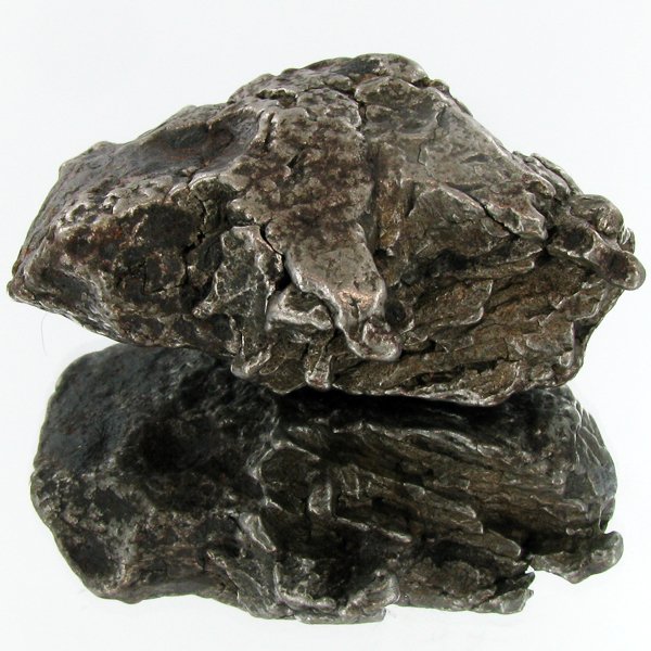 137gm Meteorite Campo Del Cielo Argentina: Scarce remnant of prehistoric (2000-4000bc) meteorite discovered in the 16th century; a main mass of 18 tons has been discovered along with a shower of smaller breakup fragments; cosmic age is young f