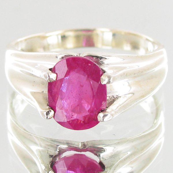 22.5twc Ruby Sterling Ring: Well crafted piece; stone with customary treatment