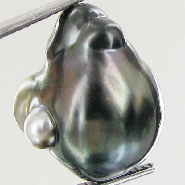 22.97ct Tahitian Baroque Pearl: Baroque shaped; drilled and ready for one-of-a-kind pendant