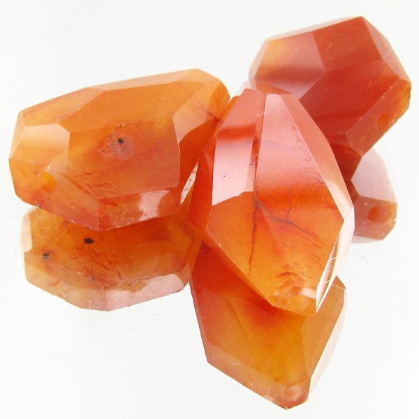 205ct Carnelian Faceted Beads Parcel: Excellent parcel with customary treatment; drilled for mounting