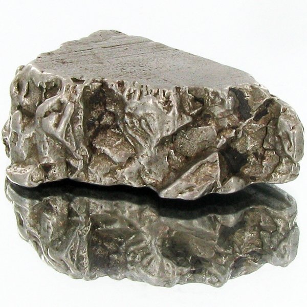 54gm Meteorite Campo Del Cielo Argentina: Scarce remnant of prehistoric (2000-4000bc) meteorite discovered in the 16th century; a main mass of 18 tons has been discovered along with a shower of smaller breakup fragments; cosmic age is young f