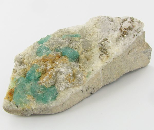 225ct Natural Colombian Emerald Crystal Cluster: Excellent specimen with pyrite crystals and small emerald crystal vein on base material