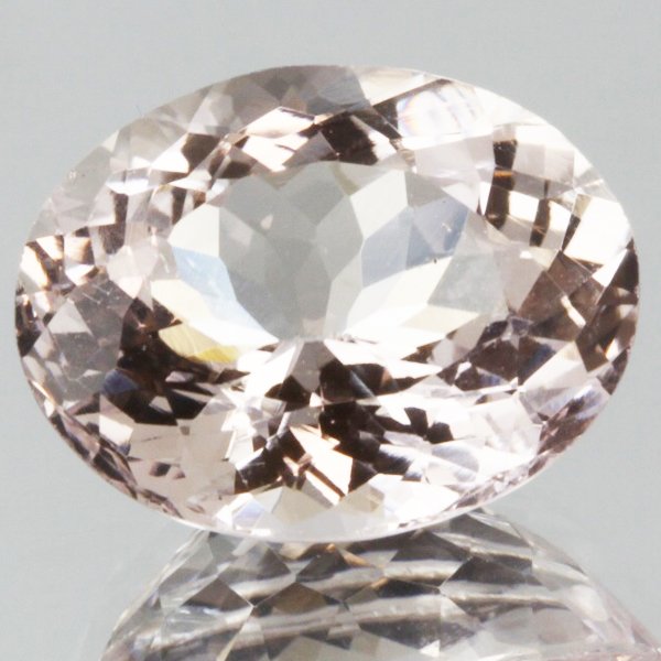 7ct Strong Peach Morganite Oval Cut: Excellent heated grade 8 of 10 specimen; estimated Gem Guide wholesale $1190, estimated retail $4200; Brazil origin
