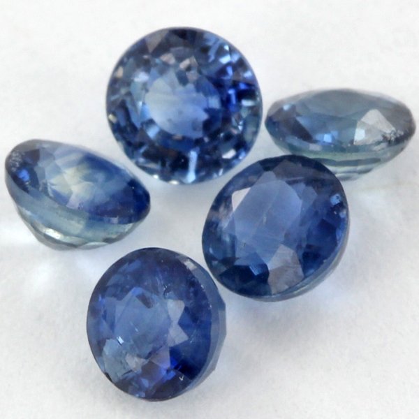 1.1ct Blue Sapphire Round Cut: Excellent Heated grade 6 of 10 specimen; estimated Gem Guide wholesale $110, estimated retail $330; Tanzania origin