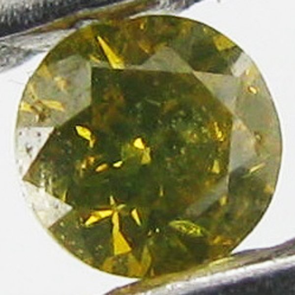 0.06ct Yellow Diamond: Excellent piece; well cut and colored; with treatment