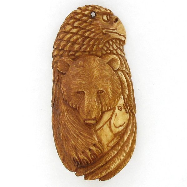 Carved Ox Bone Bear Pendant: Handcarved and well-crafted; 2"; stock photo, details may vary