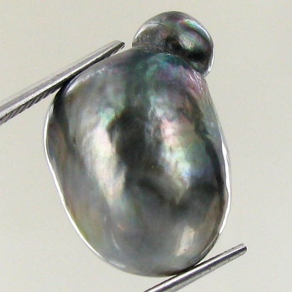 29.57ct Tahitian Baroque Pearl: Baroque shaped; drilled and ready for one-of-a-kind pendant
