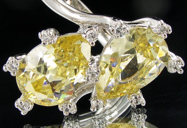 40.05twc Yellow Diamond Simulant Wht Gold Vermeil Ring: Excellent bling piece with white gold vermeil over sterling