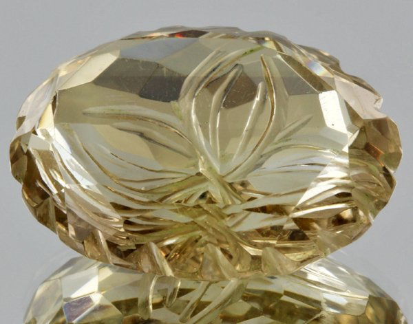 33.55ct Lemon Yellow Citrine Carved Cut: Excellent heated grade 9 of 10 specimen; estimated Gem Guide wholesale $35, estimated retail $100; Brazil origin