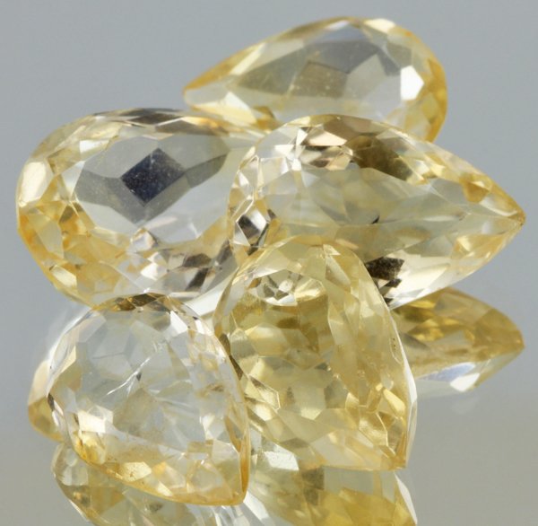 24.45ct Lemon Yellow Citrine Pear Cut Parcel: Excellent heated grade 9 of 10 specimen; estimated Gem Guide wholesale $35, estimated retail $100; Africa origin