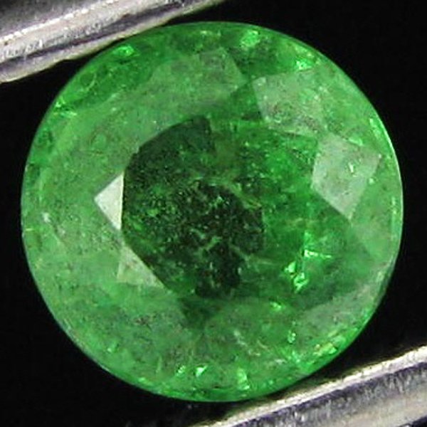 0.6ct Clean Tsavorite Garnet Round: Excellent Piece; well colored and cut; with treatment