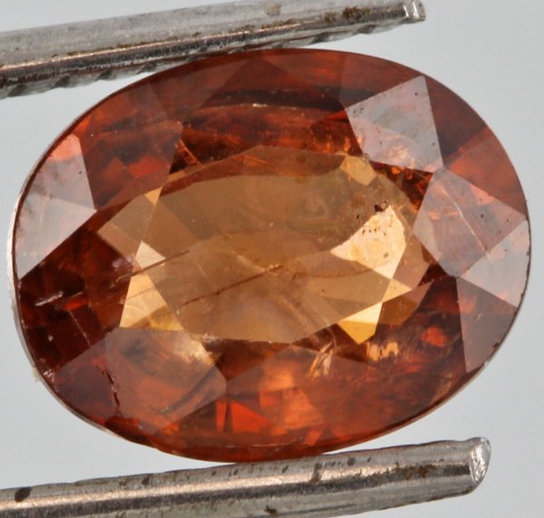 2.9ct Imperial Orange Zircon Oval Cut Cut: Excellent untreated grade 5 of 10 specimen; estimated Gem Guide wholesale $55, estimated retail $150; Cambodia origin