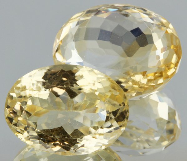 30.4ct Lemon Yellow Citrine Oval Cut Pair: Excellent heated grade 9 of 10 specimen; estimated Gem Guide wholesale $35, estimated retail $100; Africa origin