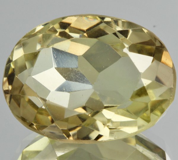 22.45ct Lemon Yellow Citrine Oval Cut: Excellent heated grade 9 of 10 specimen; estimated Gem Guide wholesale $35, estimated retail $100; Brazil origin