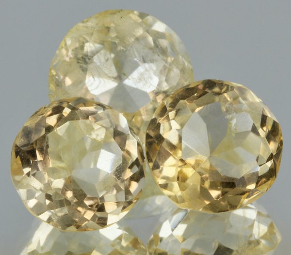 17.75ct Lemon Yellow Citrine Round Cut Parcel: Excellent heated grade 9 of 10 specimen; estimated Gem Guide wholesale $35, estimated retail $100; Africa origin