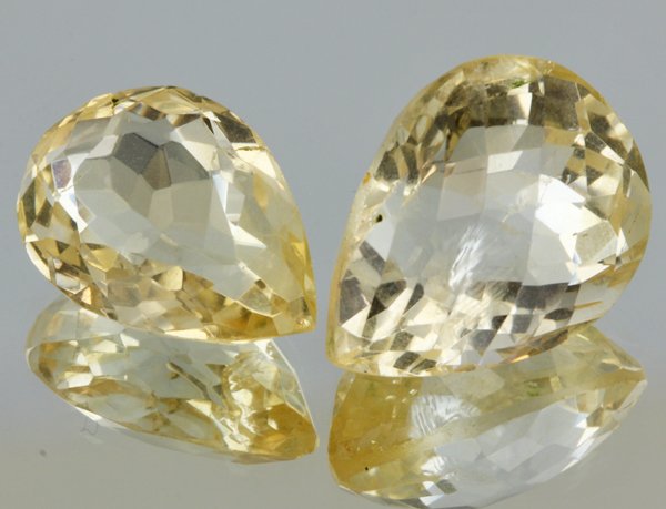 24.6ct Lemon Yellow Citrine Pear Cut Pair: Excellent heated grade 9 of 10 specimen; estimated Gem Guide wholesale $35, estimated retail $100; Africa origin